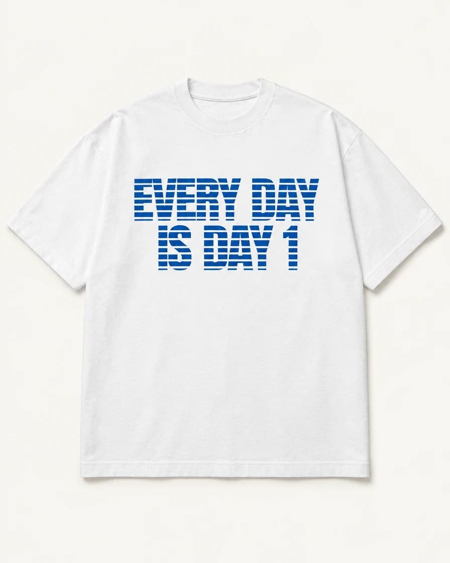 White tee with Every Day is Day 1 in blue striped letters